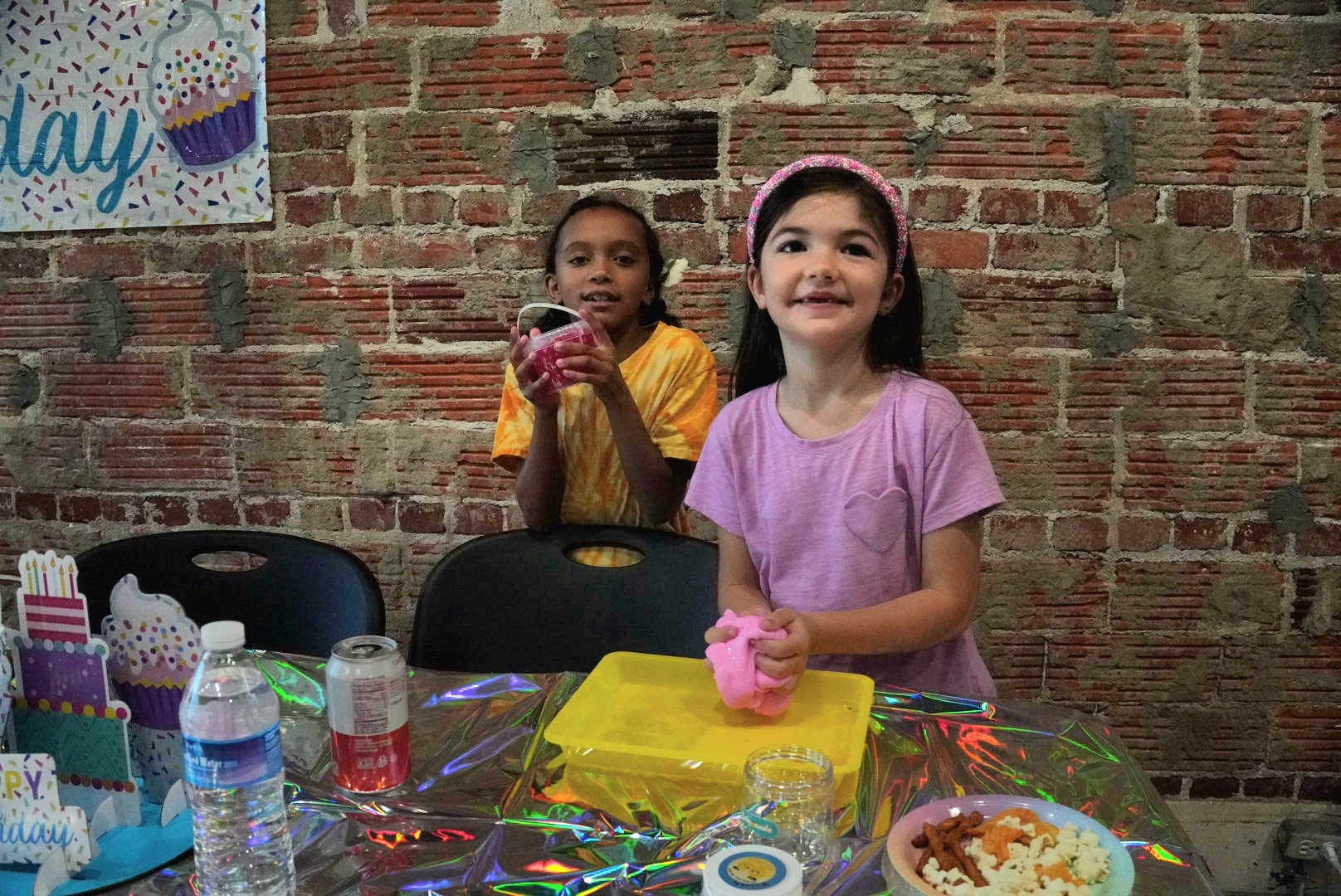 Children making slime at a birthday party